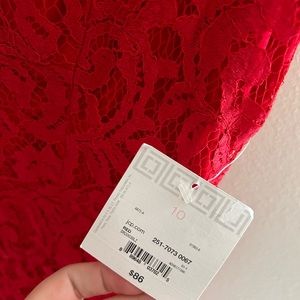 Size 10 Liz Claiborne midi dress. Red lace. Square neck and cap sleeve.